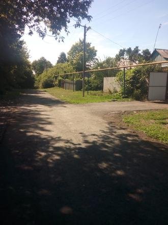 Белгородская область, Прохоровский район, село Раисовка, улица Раевского. Подъездная дорога с твердым покрытием (к информации о выполнении поручения по итогам личного приема граждан, проведенного А.Ю.Петуховым 16 декабря 2021 года)