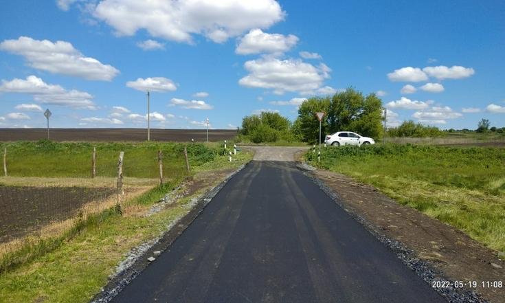 Белгородская область, Прохоровский район, село Раисовка, улица Раевского. Подъездная дорога с твердым покрытием (к информации о выполнении поручения по итогам личного приема граждан, проведенного А.Ю.Петуховым 16 декабря 2021 года)