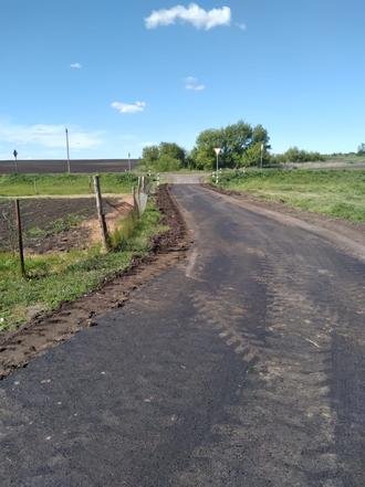Белгородская область, Прохоровский район, село Раисовка, улица Раевского. Подъездная дорога с твердым покрытием (к информации о выполнении поручения по итогам личного приема граждан, проведенного А.Ю.Петуховым 16 декабря 2021 года)