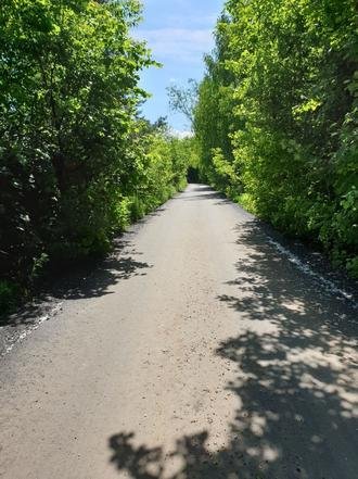 Московская область, Наро-Фоминский городской округ, Апрелевка, 2-я Майская улица. Дорога после ремонта (к информации о выполнении поручения по итогам приема граждан, проведенного А.А.Шаклуновым 25 мая 2021 года)