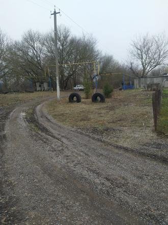 Белгородская область, Прохоровский район, село Раисовка, улица Раевского. Дорога в состоянии на дату личного приема граждан, проведенного А.Ю.Петуховым 16 декабря 2021 года
