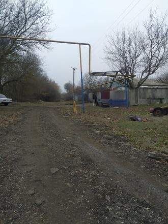 Белгородская область, Прохоровский район, село Раисовка, улица Раевского. Дорога в состоянии на дату личного приема граждан, проведенного А.Ю.Петуховым 16 декабря 2021 года